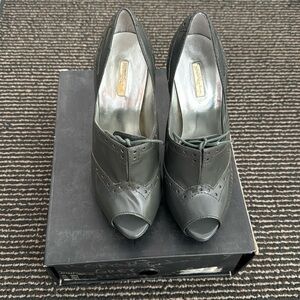 Report Signature Grey Patent Peep Stilletto Pump. Size 7. like New